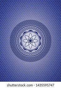 atom icon inside emblem with jean texture