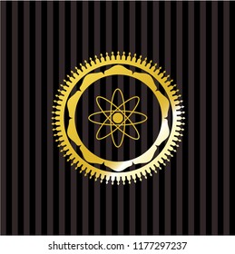 atom icon inside golden emblem