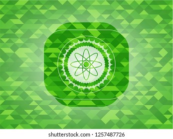 atom icon inside green mosaic emblem