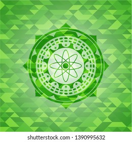atom icon inside green mosaic emblem