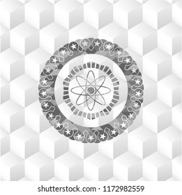 atom icon inside grey badge with geometric cube white background