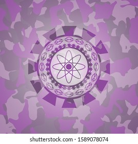 atom icon inside pink camouflage emblem