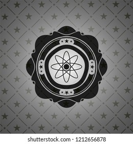 atom icon inside realistic black emblem