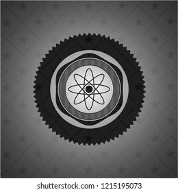 atom icon inside realistic dark emblem