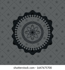 atom icon inside realistic dark emblem
