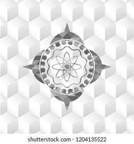 atom icon inside realistic grey emblem with geometric cube white background