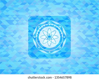atom icon inside realistic light blue emblem. Mosaic background