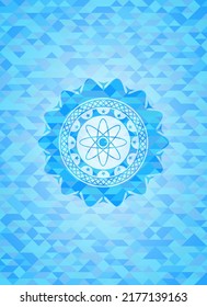 atom icon inside realistic light blue mosaic emblem. 