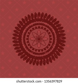 atom icon inside red emblem