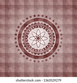 atom icon inside red seamless geometric emblem.