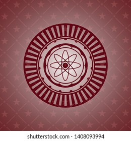 atom icon inside retro style red emblem