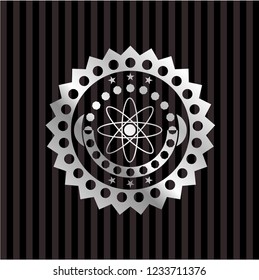 atom icon inside silver badge