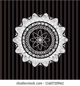 atom icon inside silver emblem