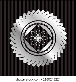 atom icon inside silvery shiny emblem