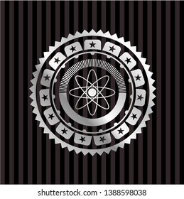 atom icon inside silvery shiny emblem