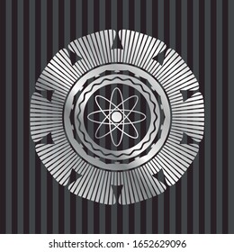 atom icon inside silvery shiny emblem