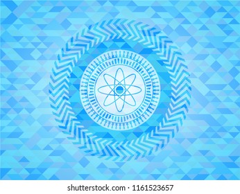 atom icon inside sky blue mosaic emblem