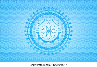 atom icon inside sky blue water wave emblem.