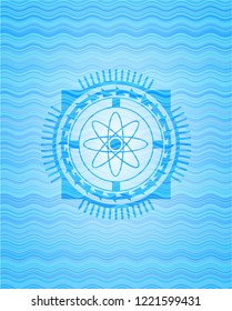 atom icon inside sky blue water emblem background.