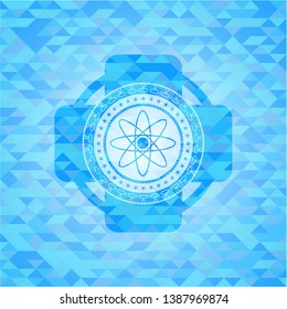 atom icon inside sky blue emblem with triangle mosaic background