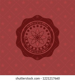 atom icon inside vintage red emblem