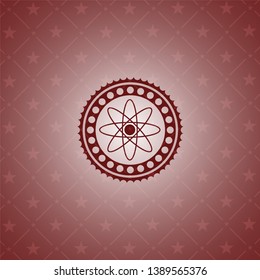 atom icon inside vintage red emblem