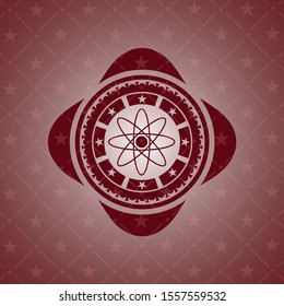 atom icon inside vintage red emblem