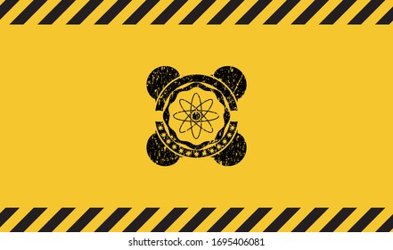 atom icon inside warning sign, black grunge emblem. Vector Illustration. Detailed.