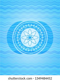 atom icon inside water representation style emblem.