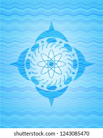 atom icon inside water wave badge.