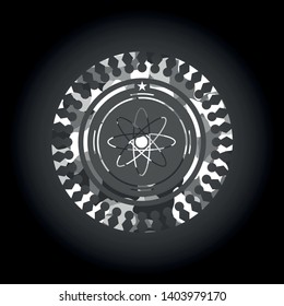 atom icon on grey camouflage texture
