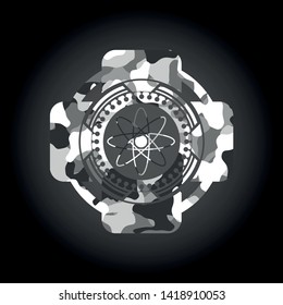 atom icon on grey camouflaged texture