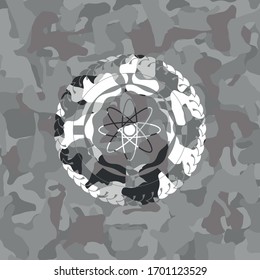 atom icon on grey camouflaged pattern