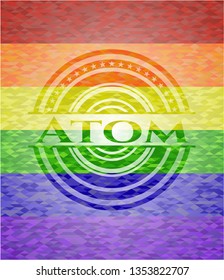 Atom on mosaic background with the colors of the LGBT flag