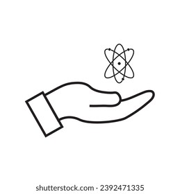 An atom sign floating on a human hand on a white background with copy space