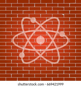 Atom sign illustration. Vector. Whitish icon on brick wall as background.
