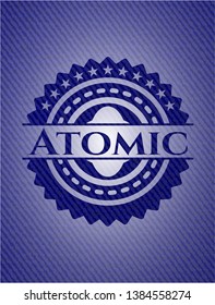 Atomic emblem with jean high quality background. Vector Illustration. Detailed.