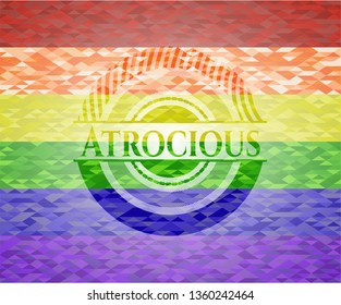 Atrocious emblem on mosaic background with the colors of the LGBT flag