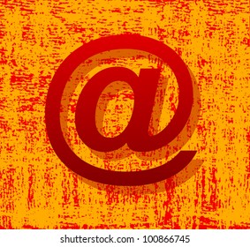At-sign on abstract orange background