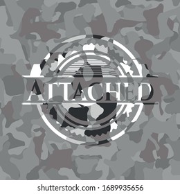 Attached on grey camouflaged pattern