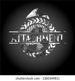 Attachment on grey camo texture Attachment on grey camo texture