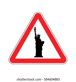 Attention America. Statue of Liberty on red triangle. Road sign  Caution USA