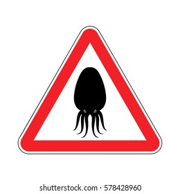 Attention cuttlefish. Octopus on red triangle. Road sign Caution devilfish
