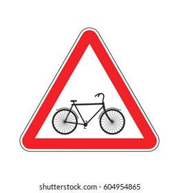 Attention cyclist. bicycle on red triangle. Road sign Caution bicyclist