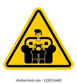 Attention gamer. Yellow road sign danger. Caution guy plays video game. Vector illustration
