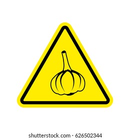 Attention garlic in yellow triangle. Road sign attention pungent smell