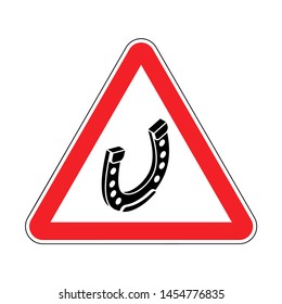 Attention Horseshoe. Caution Good luck symbol. Red triangle road sign