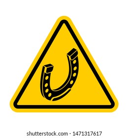 Attention Horseshoe. Caution Good luck symbol. yellow triangle road sign