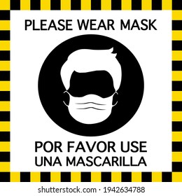 An attention sign said PLEASE WEAR MASK both English and Spanish. There’s a man wearing a face mask in a circle at the center.