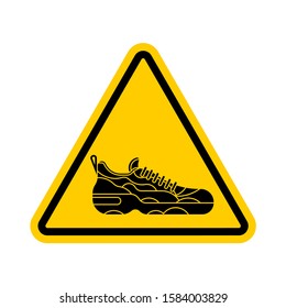 Attention Sneaker. Caution Sneakers. Yellow triangle road sign